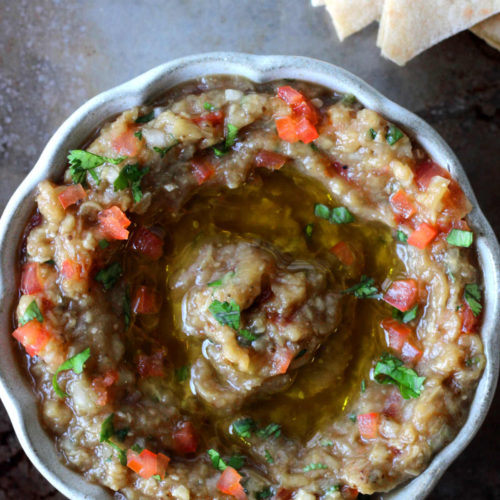 Roasted eggplant dip without tahini served with pita.